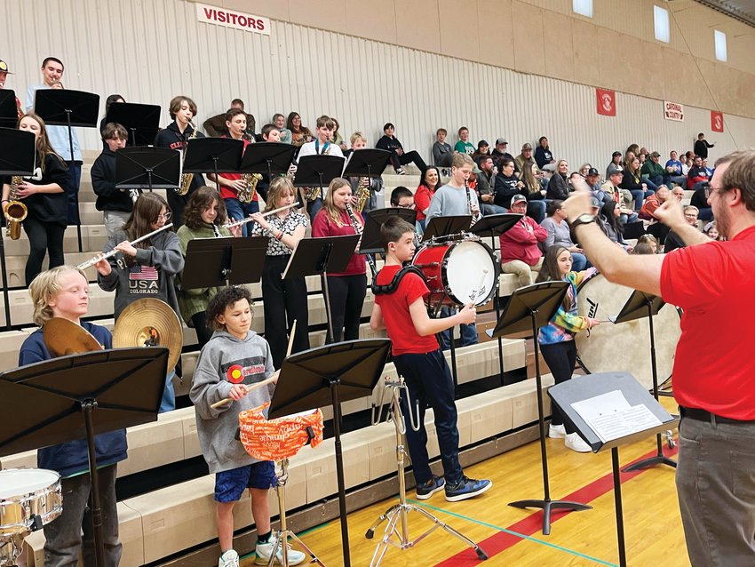 The Elizabeth Middle School band entertains the crowd at the unified basketball game.