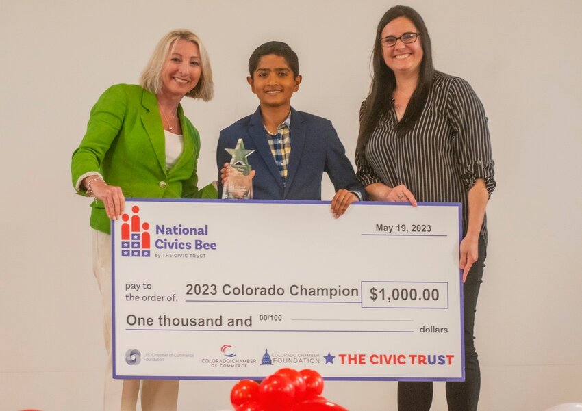 Yalavarthy is presented with his winning check.