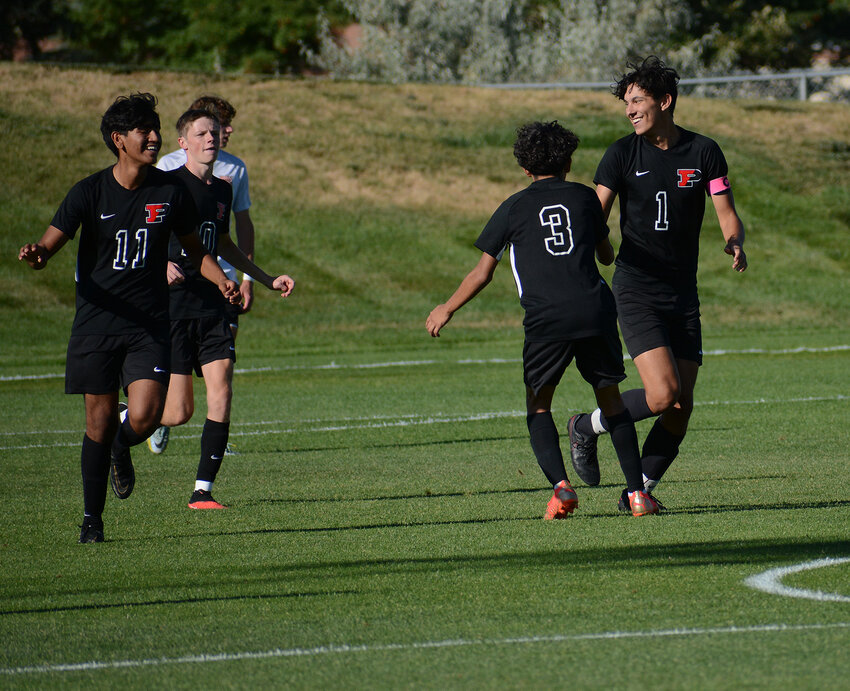 Pomona senior James Steele (1) celebrates with teammates after his goal in the 5th minute Tuesday, Aug. 29, at the North Area Athletic Complex gave the Panthers a 1-0 lead over Erie. However, the Tigers scored four unanswered goals to take a 4-1 win.