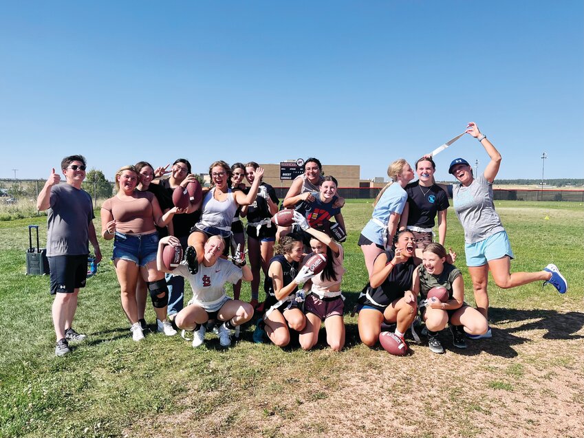 The Elizabeth High School girls' flag football team in a moment of levity.
