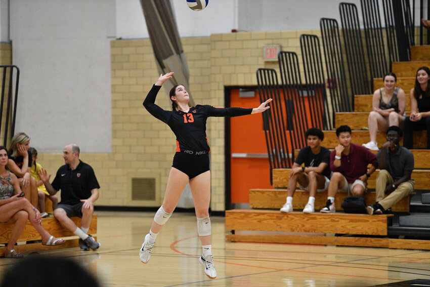 Erin McNair is fired up for her freshman season at Princeton University. Here, McNair prepares a serve in the preseason.