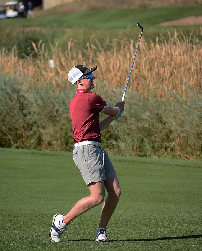 Chatfield junior Jesse Hand watches his approach shot during his back-nine at West Woods Golf Club on Tuesday, Sept. 12. Hand won the Class 5A Jeffco League medalist title by a single stroke over Valor Christian's Ethan Rainey.
