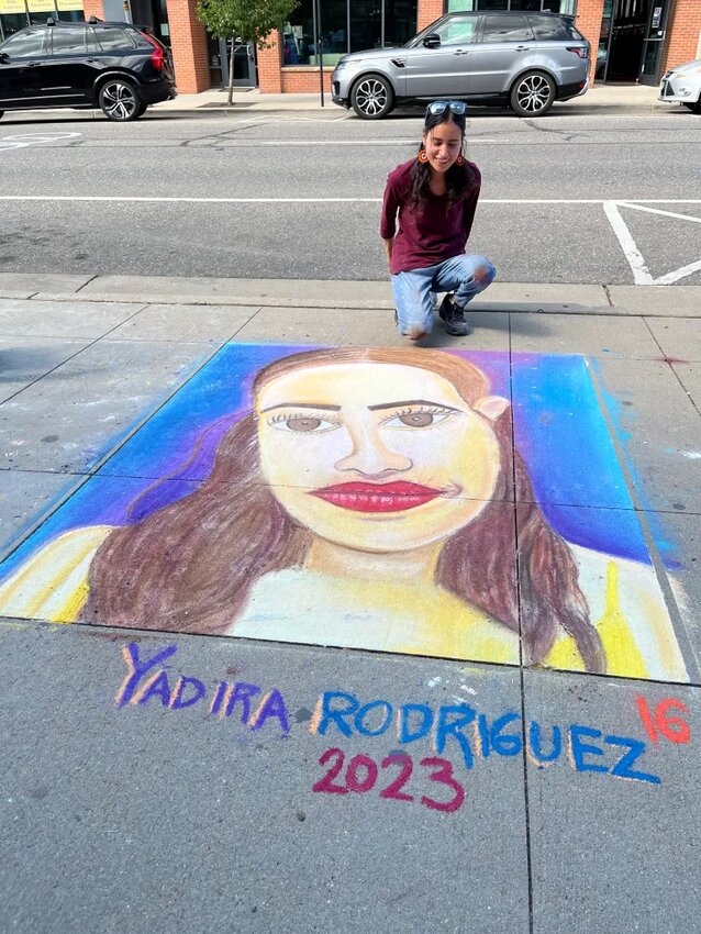 Artist Yadira Rodriguez drew a detailed portrait at the Walk the Chalk event.