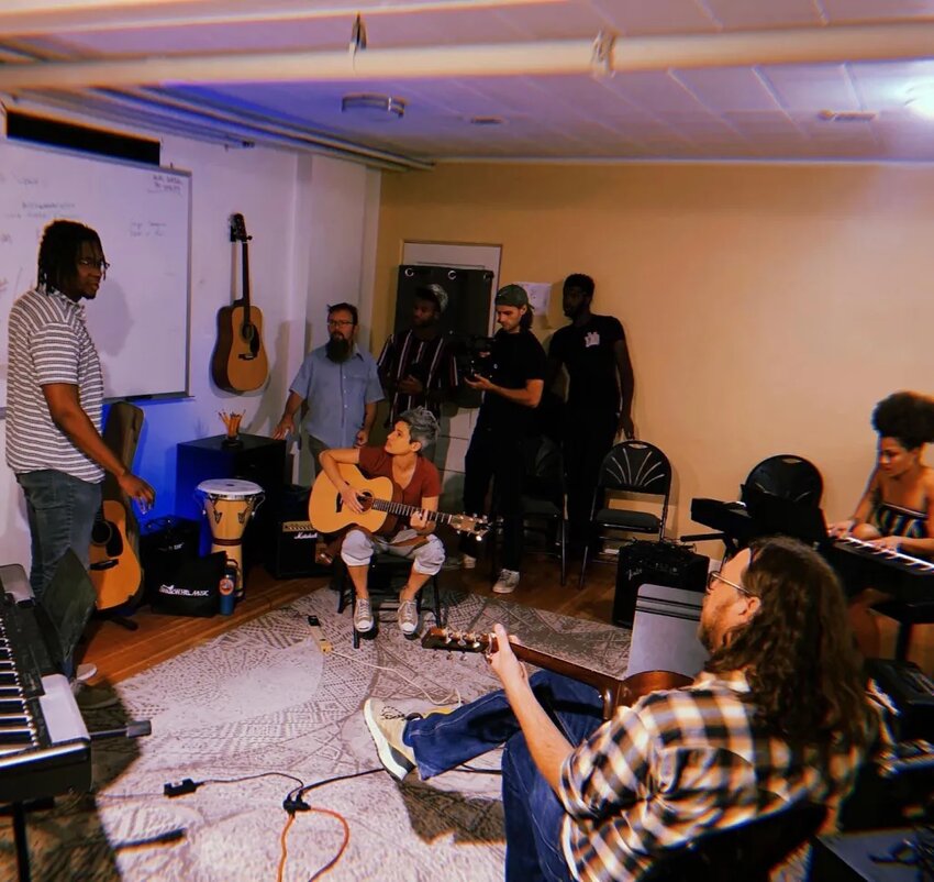 The co-directors of the Black Legacy Project in Denver work on the original song, “Let Me Walk In Your Shoes,” at Swallow Hill in September last year.