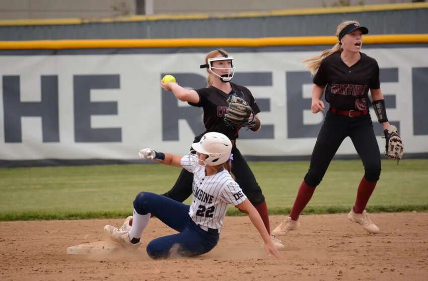 Chatfield junior Ava Burgess forces out Columbine sophomore Mason Abraham (22) at second base during the second inning Monday, Sept. 18, at Dave Sanders Memorial Field. The Chargers took a 5-3 victory against the defending 5A Jeffco League and 5A state champions.
