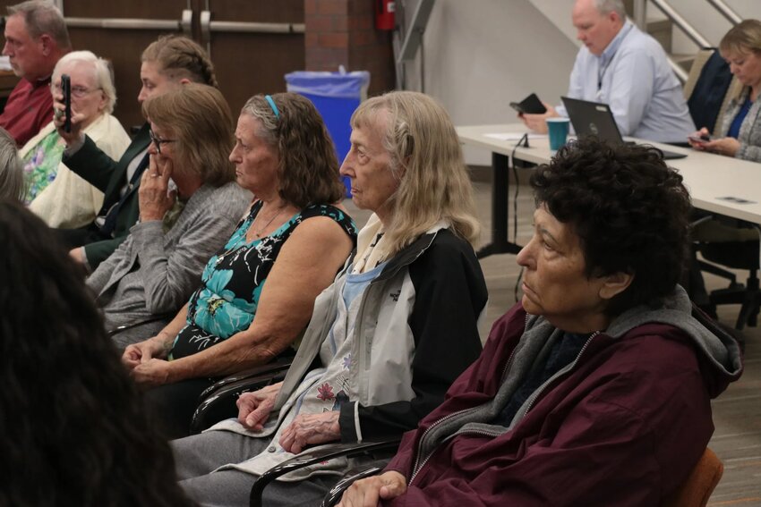 Many residents of Geneva Village attended the city council meeting on Sept. 19, at which the council decided to redevelop their apartment complex.