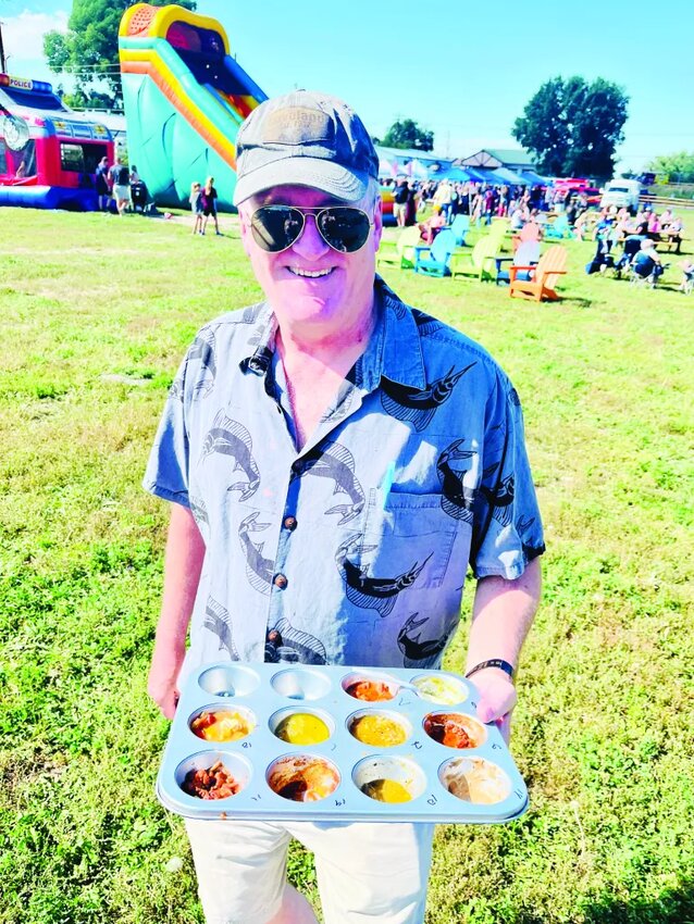 Jeff Malwitz and his muffin tin chili-tasting tray at the 6th Annual Protectors of Elizabeth and Elizabeth Fire Community Foundation's Chili Cook-Off and Roasting Event.