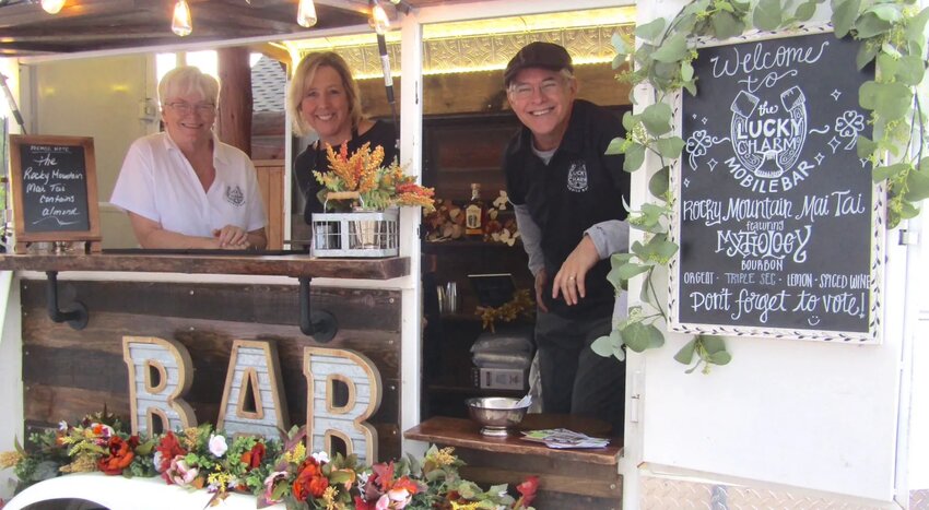 From left, Melissa Wager, Jill Manser and Michael Manser with the Lucky Charm Mobile Bar are ready to serve Rocky Mountain Mai Tais at Taste of Evergreen on Sept. 19. The outdoor event allows area restaurants and food trucks to show some of their creations to the public.